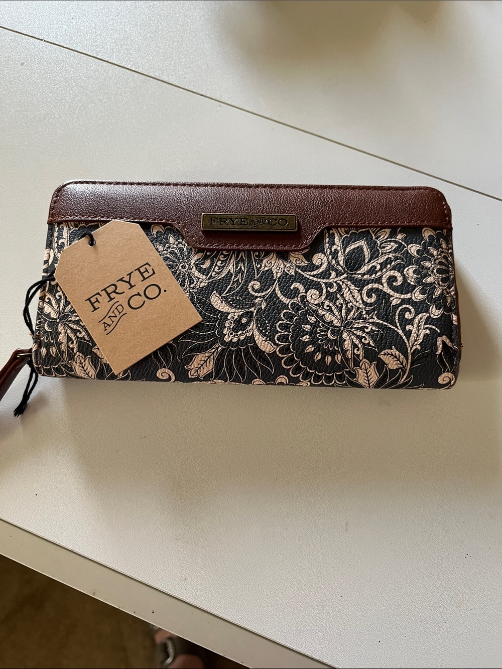 FRYE AND CO. Blue Floral Zip Wallet with Brown Trim